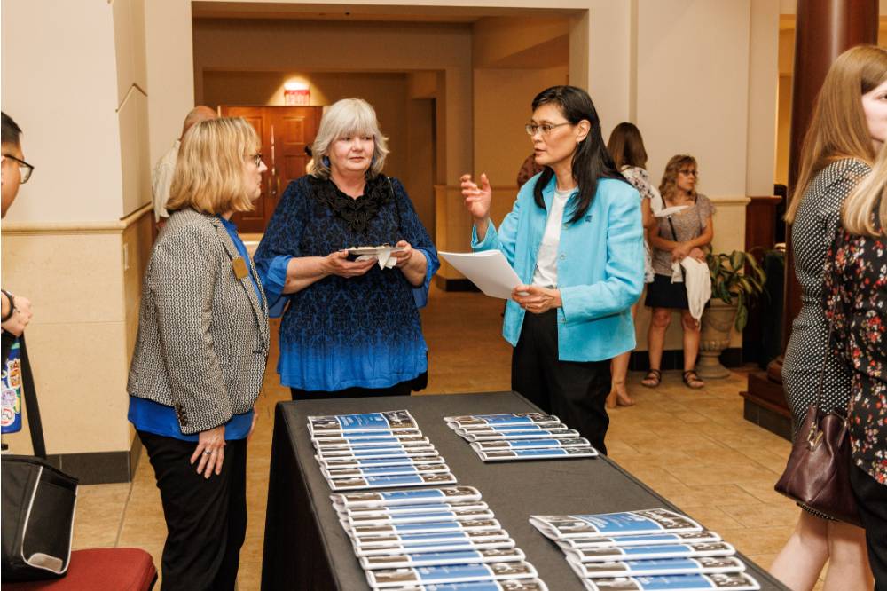 Sheri Devries (left), Irene Fountain (middle), and Dr. Sok Kean Khoo (right) in a conversation